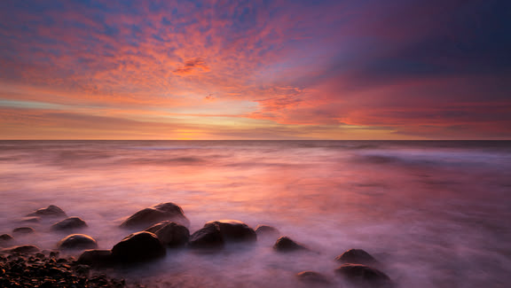 Reisefotografie: Sonnenuntergang am Wasser von Fotodozent Heinz Wohner